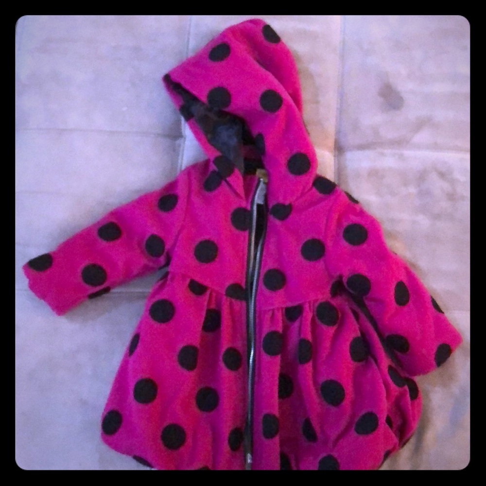 Adorable pink and black polkadot baby coat.